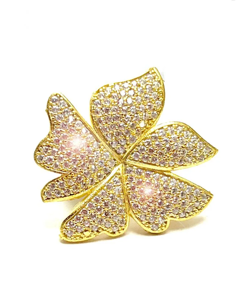 ANILLO MUJER BAÑADO EN ORO DE BISUTERÍA FINA CON FLOR EN CRISTAL FACETADO BLANCO