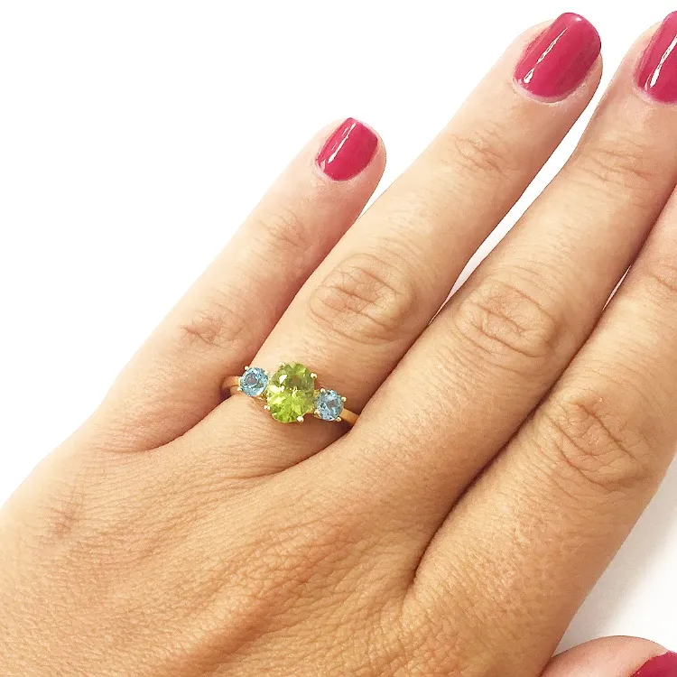 *Anillo Oro 18kts con Peridoto y Topacios azules