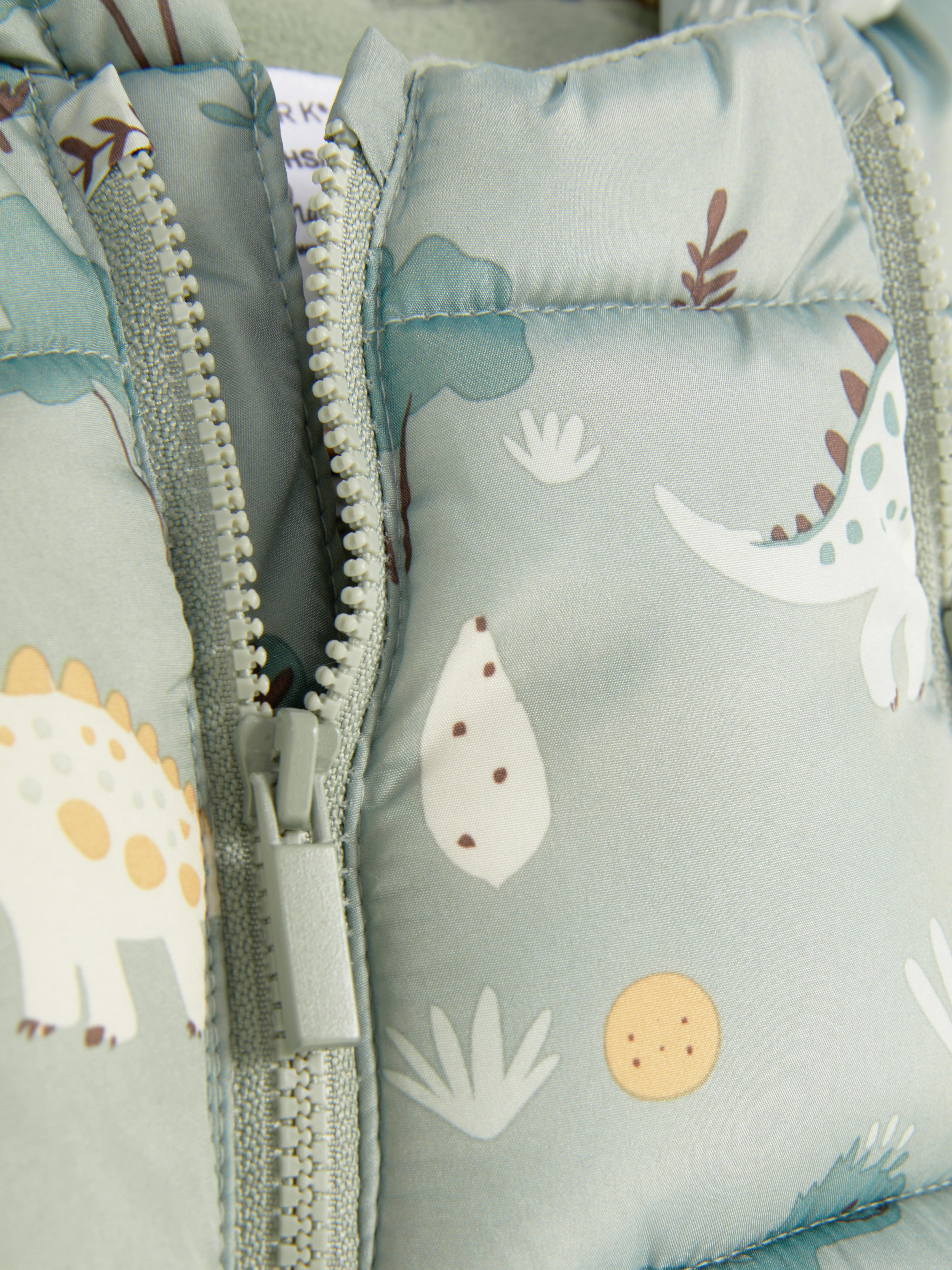 Buzo con estampado de dinosaurios para bebé