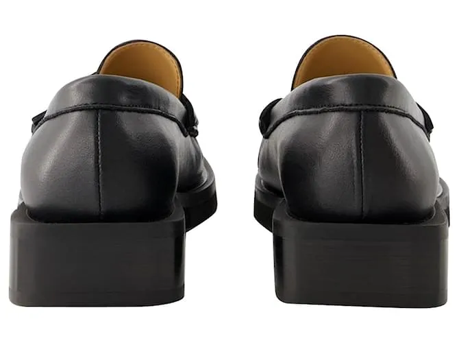 MOCASíN CON LOGO DE MARIPOSA  GANNI  PIEL  NEGRO 