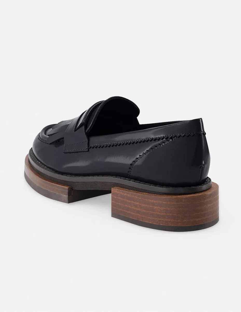Mocasín de piel florentic con flecos color negro para mujer
