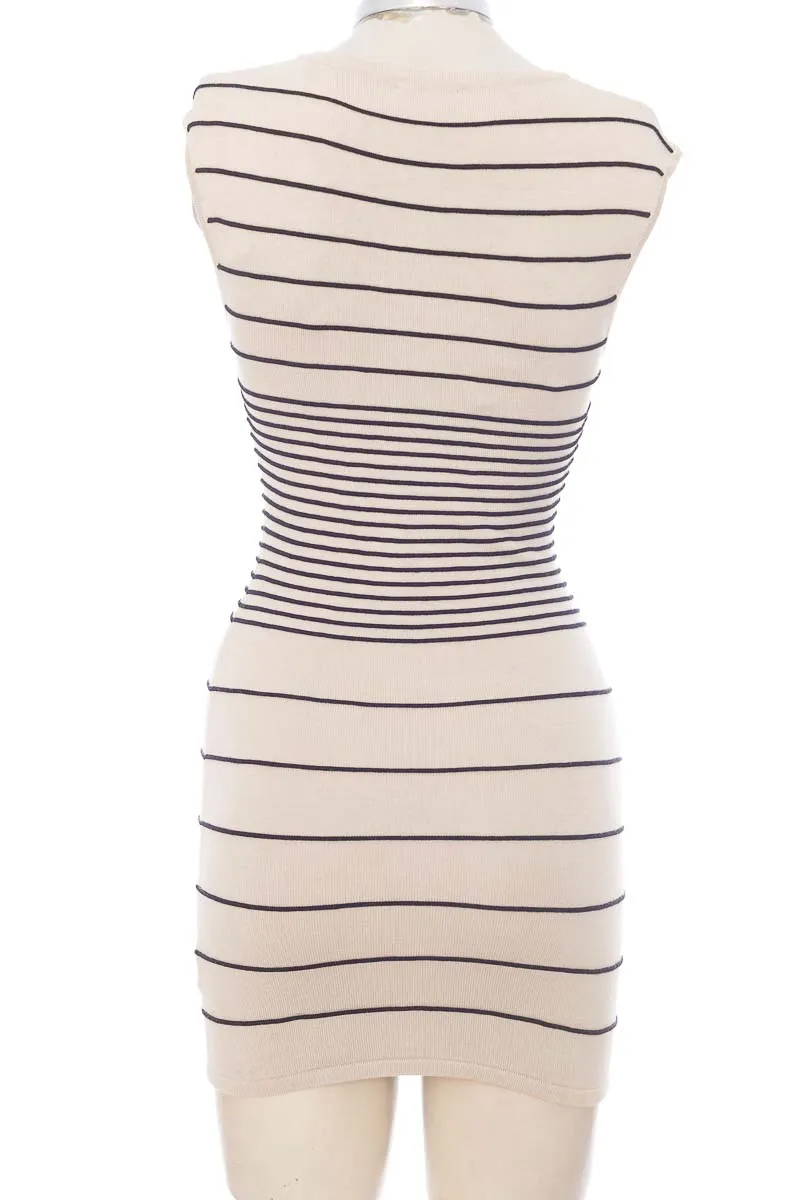 VESTIDO / ENTERIZO COLOR BEIGE  BEBE